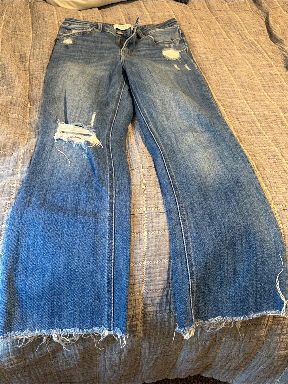 Women’s Flare Distressed Jeans in Medium Blue